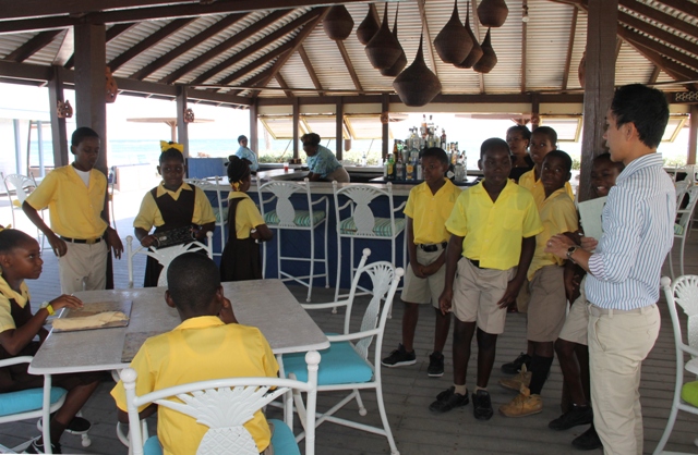 Students of the St. Thomas Primary School at the Nisbet Plantation Beach Club with Assistant General Manager Don Diaz on May 04, 2017, as part of the Ministry of Tourism’s Hospitality Immersion exercise
